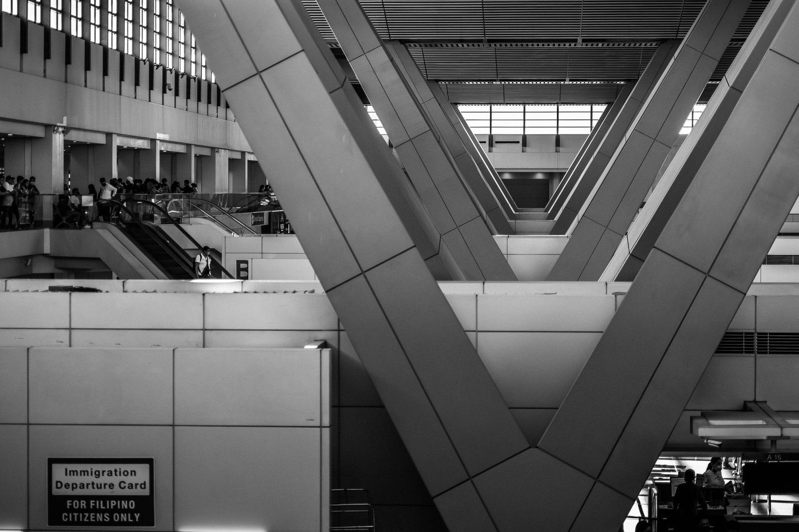 Black and white view of structural beams at an airport terminal in Pasay, Philippines