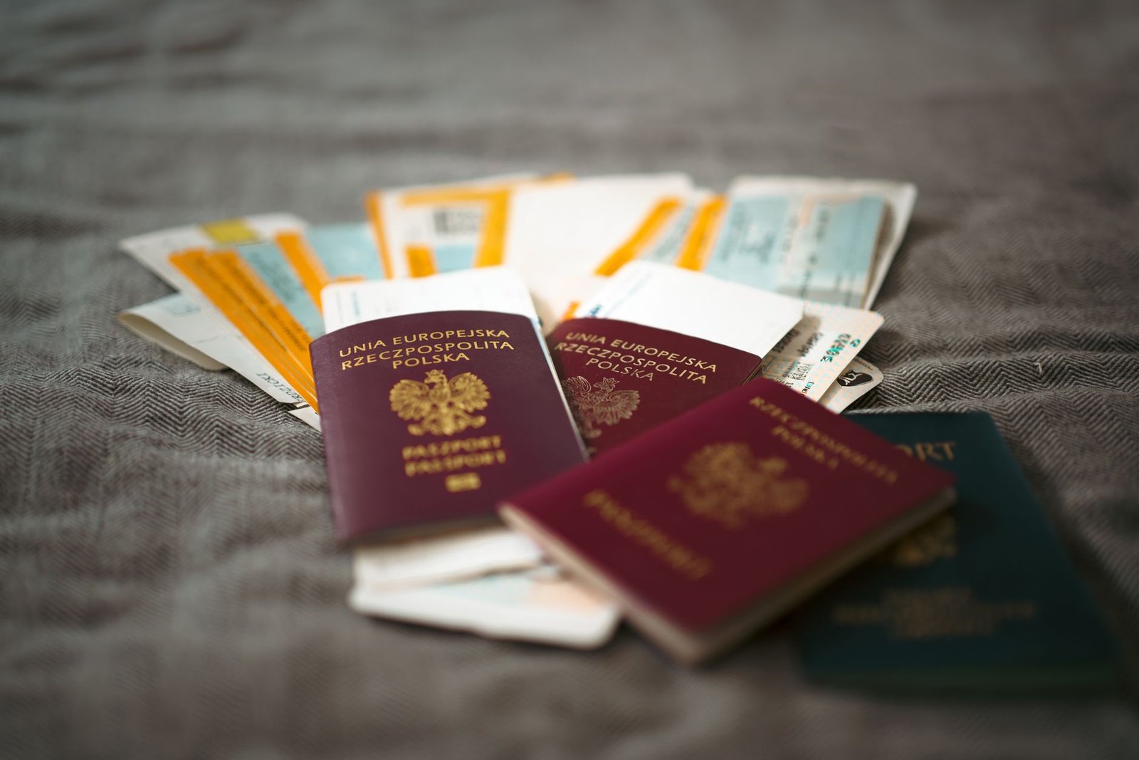 Close-up of Polish passports and travel tickets symbolizing travel and adventure